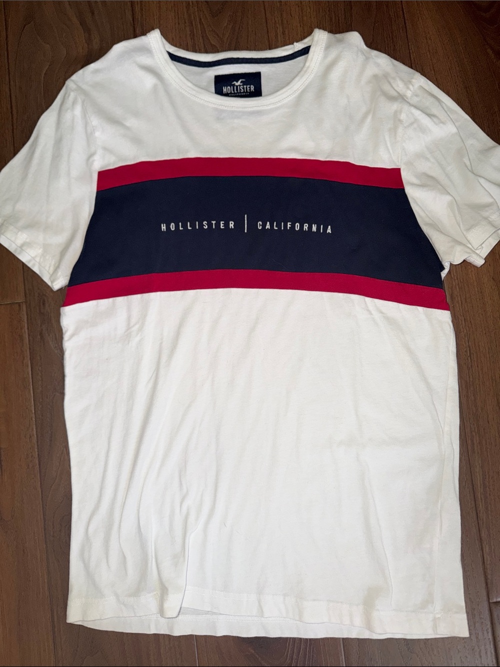 Hollister White Tee with Blue and Red Stripe. Size large.